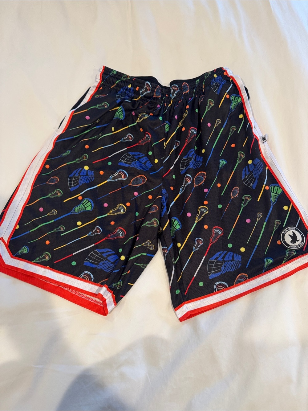 Flow Society Black Lacrosse Print Kids Shorts with orange Trim youth XL